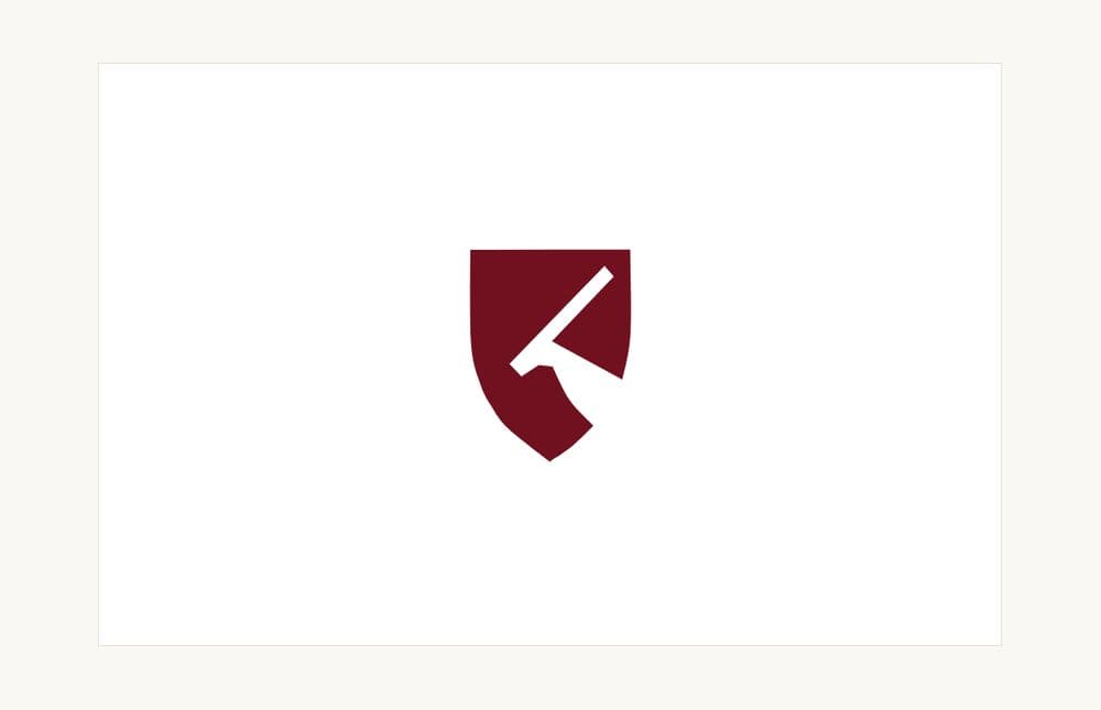 The business card front, the maroon shield alone