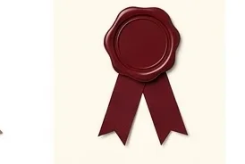 A maroon wax seal with ribbon